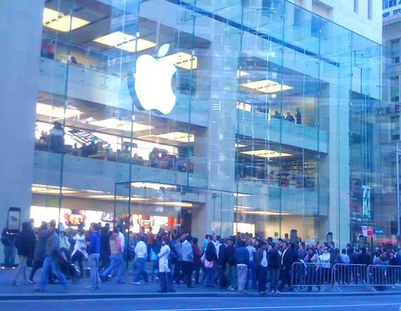 Customers in front of an Apple Store